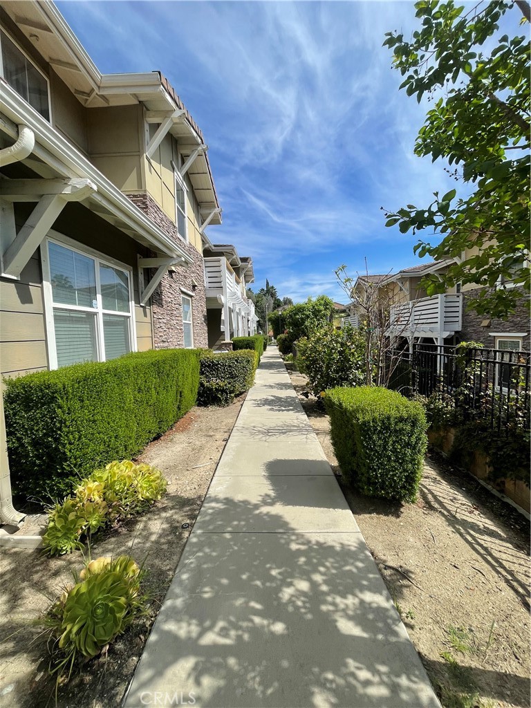 835 Francesca Drive, Unit 201 Walnut, CA 91789 - Photo 12 of 12 a view of a garden with pathway