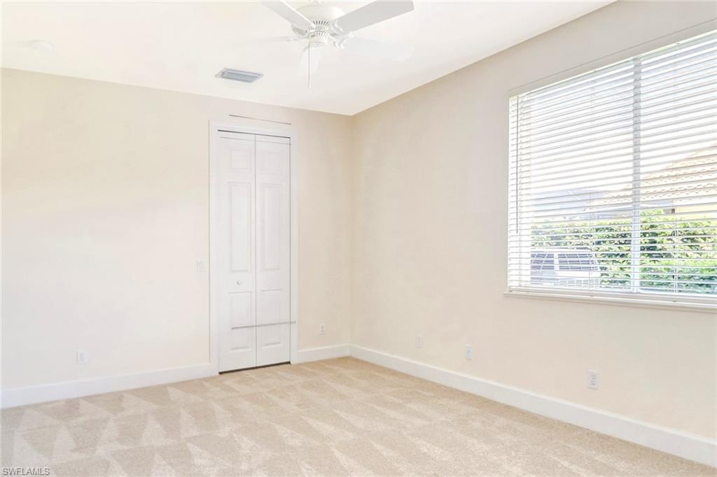 263 Monterey Drive Naples, FL 34119 - Photo 24 of 35 an empty room with a window