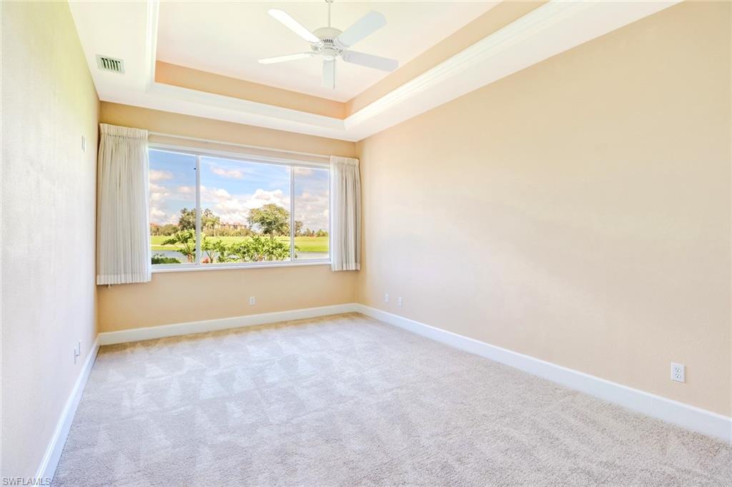 263 Monterey Drive Naples, FL 34119 - Photo 25 of 35 an empty room with a window and a ceiling fan