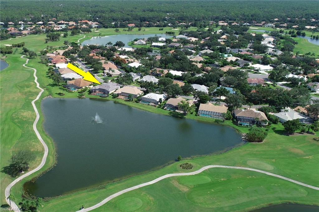 263 Monterey Drive Naples, FL 34119 - Photo 3 of 35 an aerial view of a residential houses with outdoor space and swimming pool