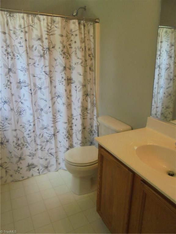 8203 Daltonshire Drive Oak Ridge, NC 27310 - Photo 13 of 18 Gallery Image 13