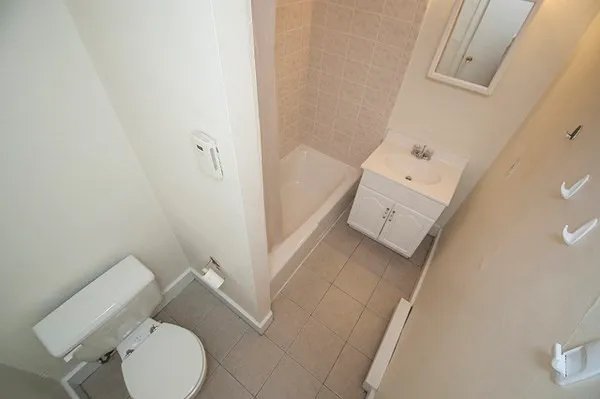 a bathroom with a toilet and sink