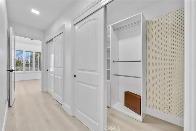 an aerial view of a city with lots of residential buildings lake and ocean view