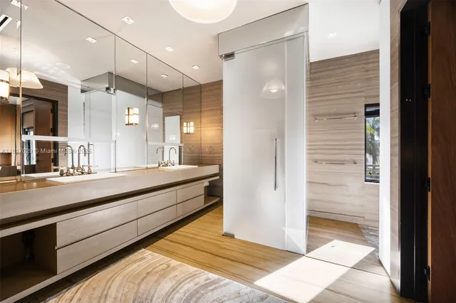 a bedroom with a bed couch and a window