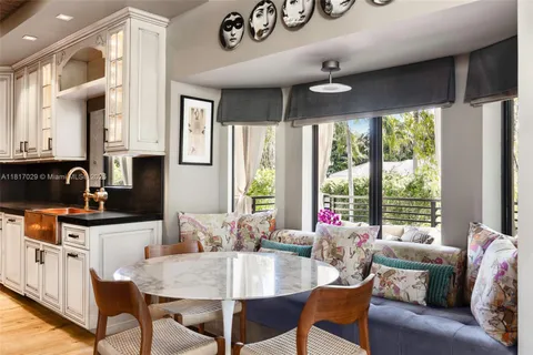 a view of living room with furniture and garden view