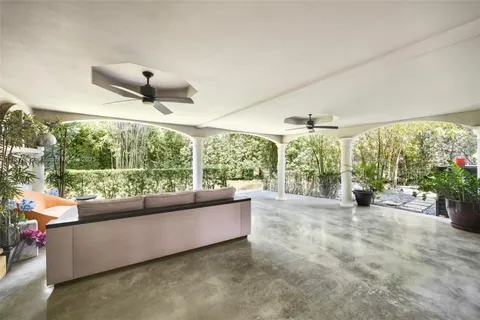 a view of a balcony with chairs