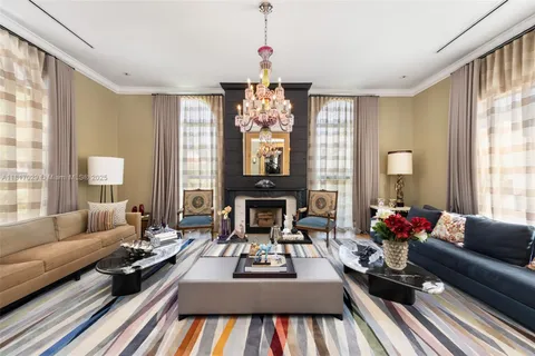 a dining room with furniture window and wooden floor