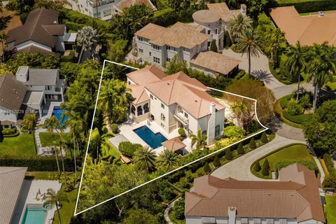 an aerial view of residential building with parking space