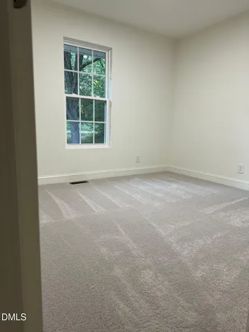 a view of empty room with window