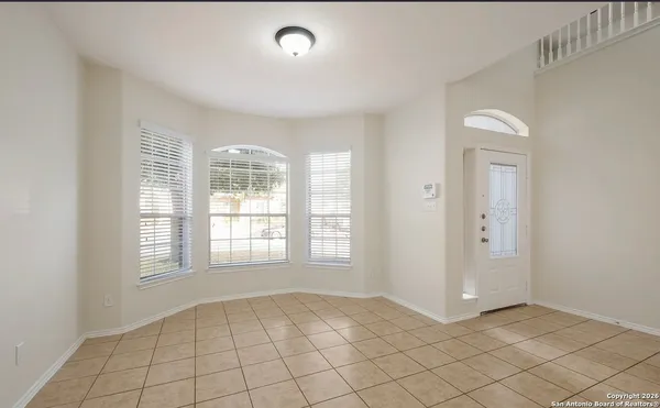 an empty room with windows