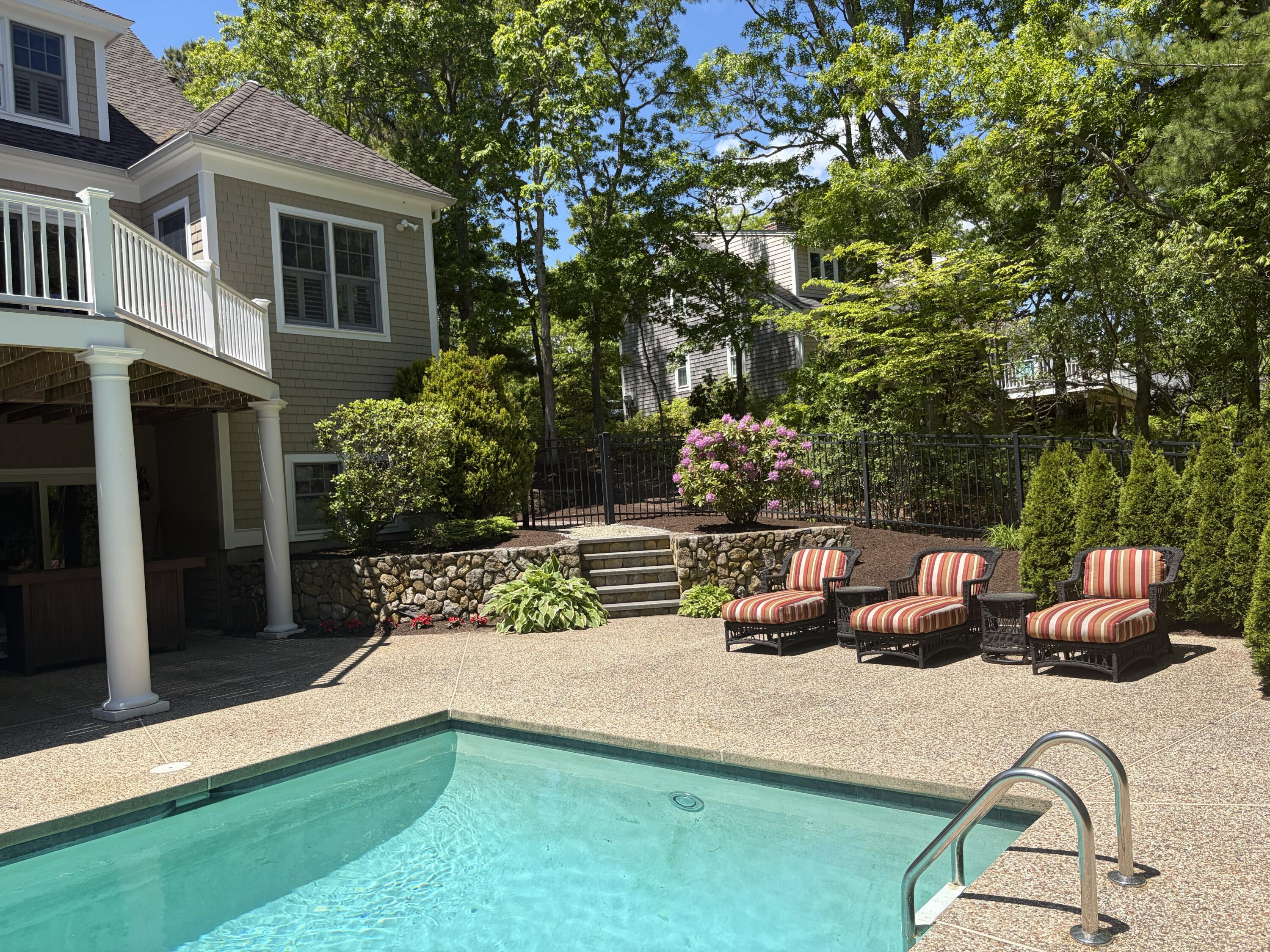 36 Troon Way Mashpee, MA 02649 - Photo 37 of 51 Seating area and pool