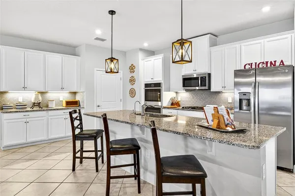 a living room with furniture or couch and a wooden floor