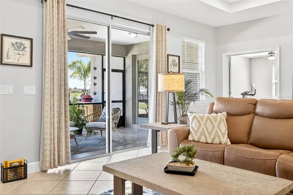 a large white bathroom with a sink a mirror and a bathtub