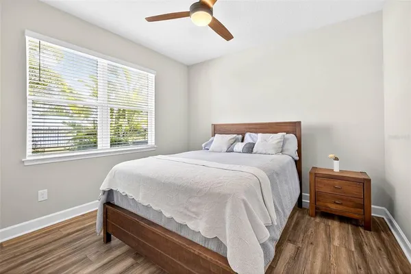 a view of a backyard with sitting area and furniture