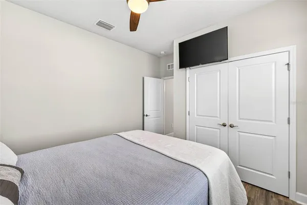 a view of a backyard with a fence