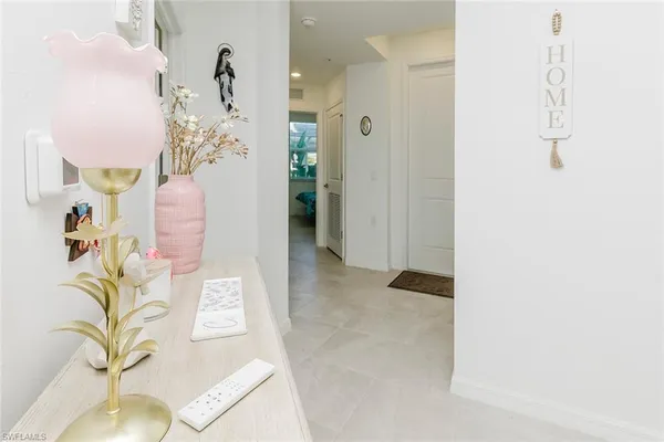 a kitchen with cabinets and stainless steel appliances