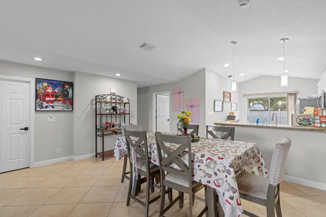 a view of a dining room with furniture