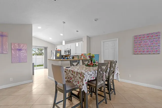 a view of a dining room with furniture
