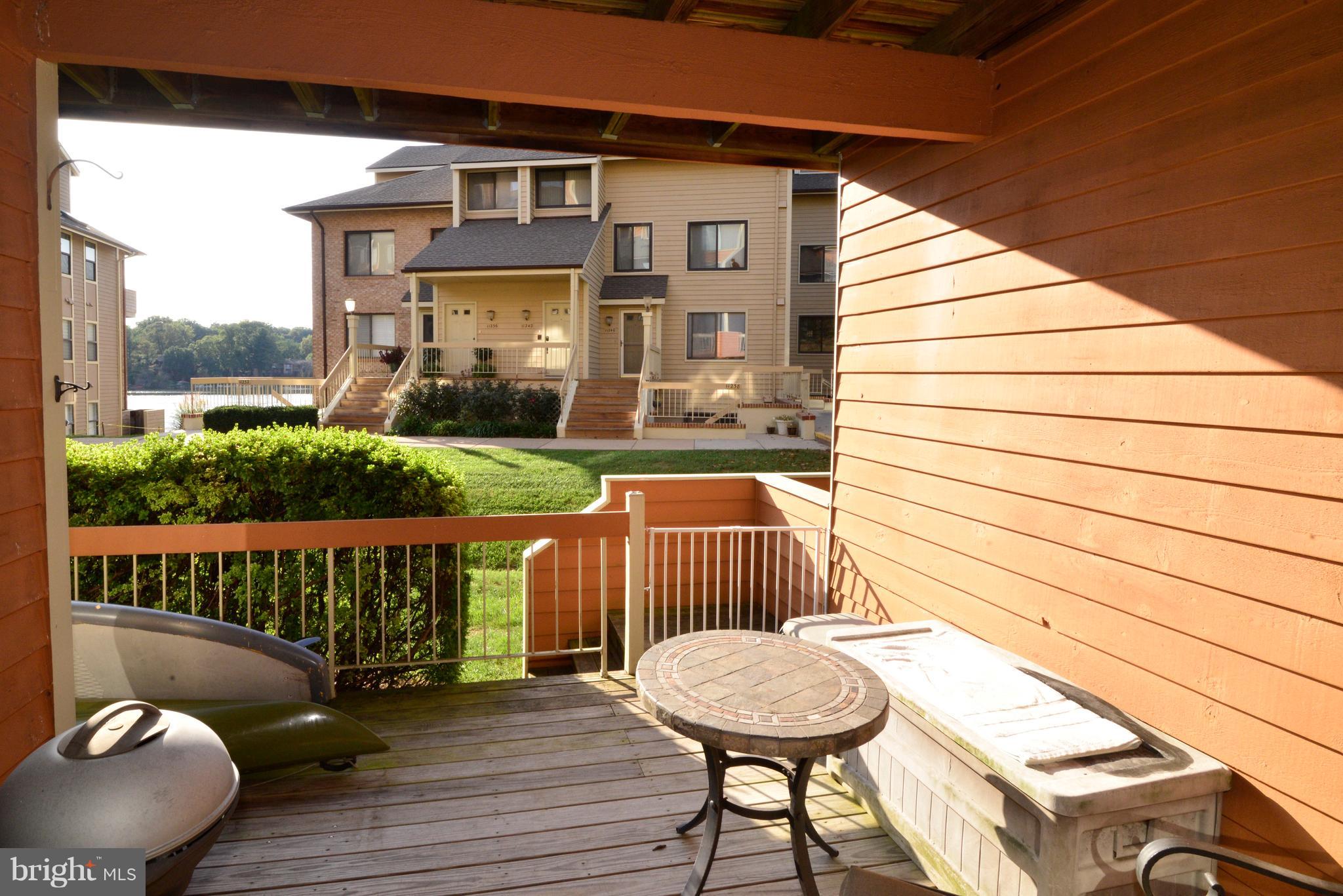 11220 Harbor Court, Unit 11220 Reston, VA 20191 - Photo 16 of 29 Deck with some lake views and dining space, too!
