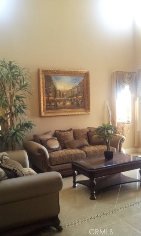 1500 Rio Verde Circle Bay Point, CA 94565 - Photo 17 of 47 a living room with furniture and a painting on the wall
