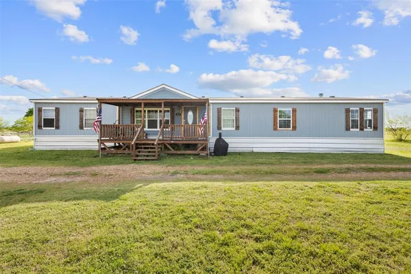 a view of a house with a swimming pool