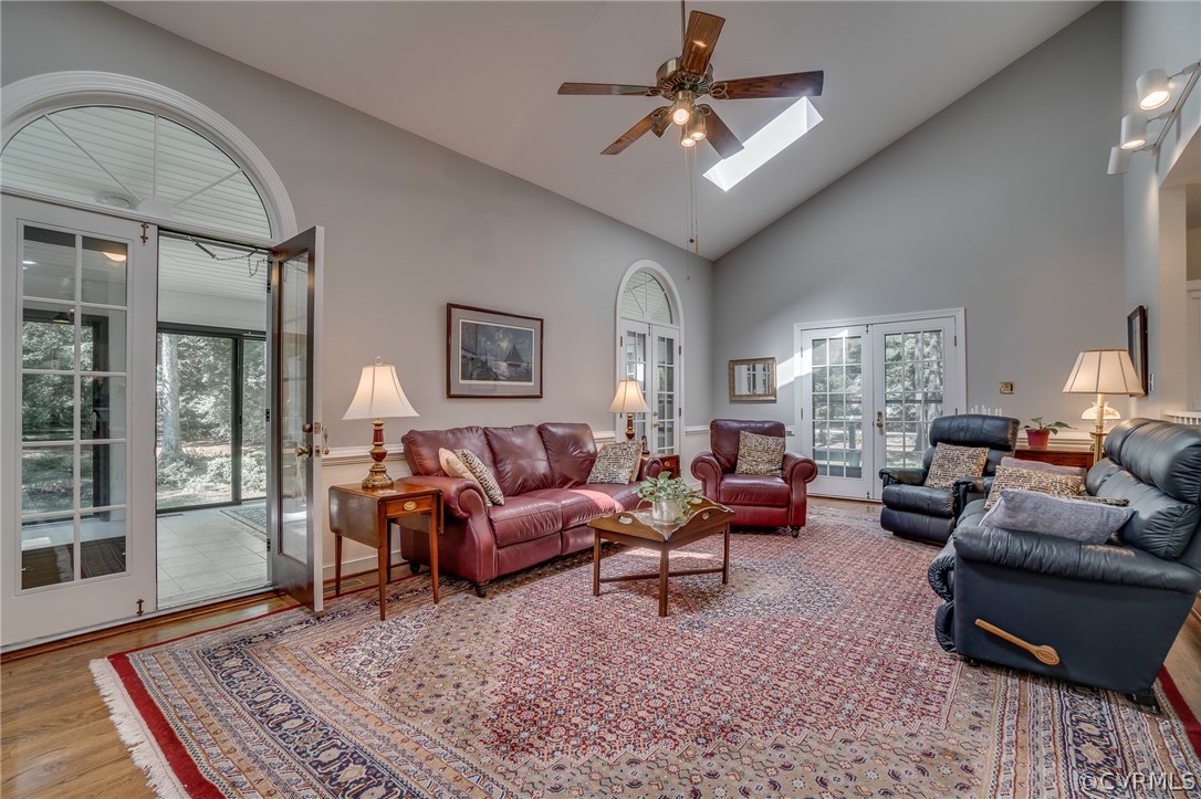 13131 Drakewood Road Midlothian, VA 23113 - Photo 15 of 29 a living room with furniture a rug a lamp and a rug