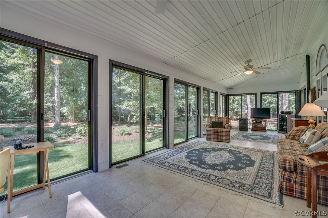 13131 Drakewood Road Midlothian, VA 23113 - Photo 17 of 29 a living room with furniture floor to ceiling window and floor to ceiling window
