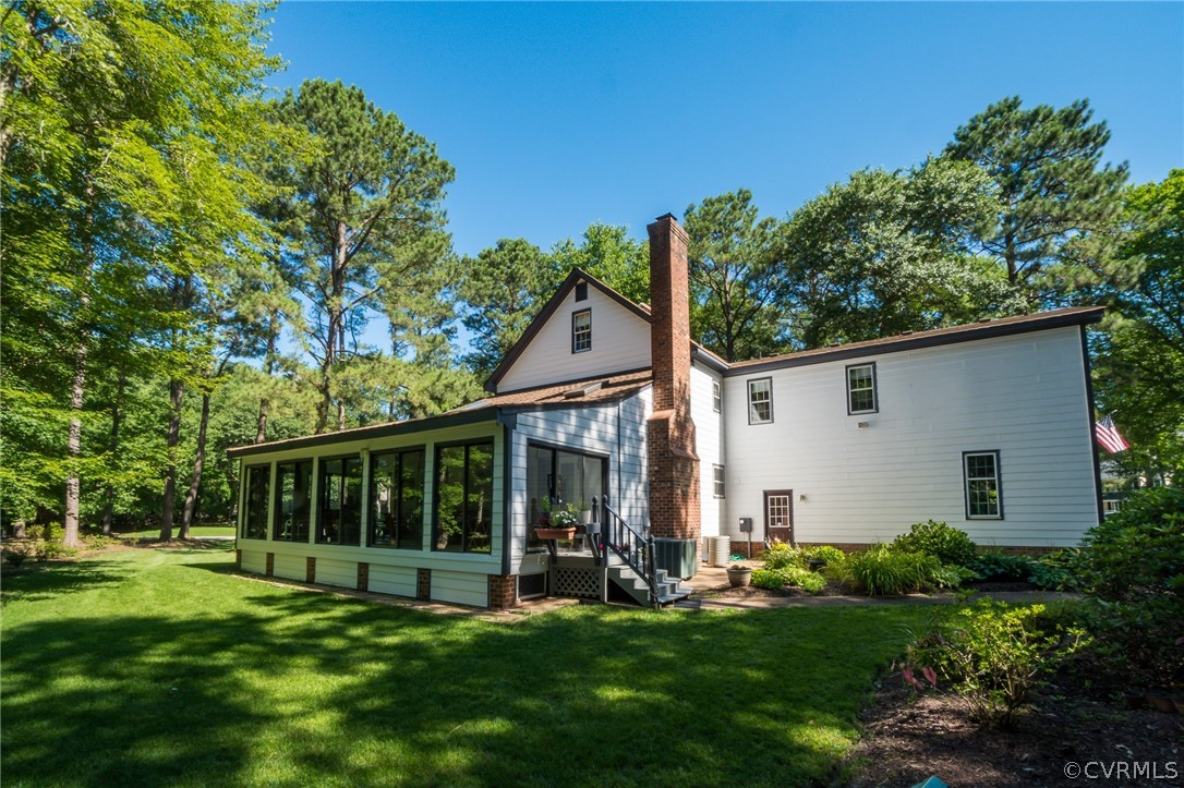13131 Drakewood Road Midlothian, VA 23113 - Photo 4 of 29 front view of a house with a yard