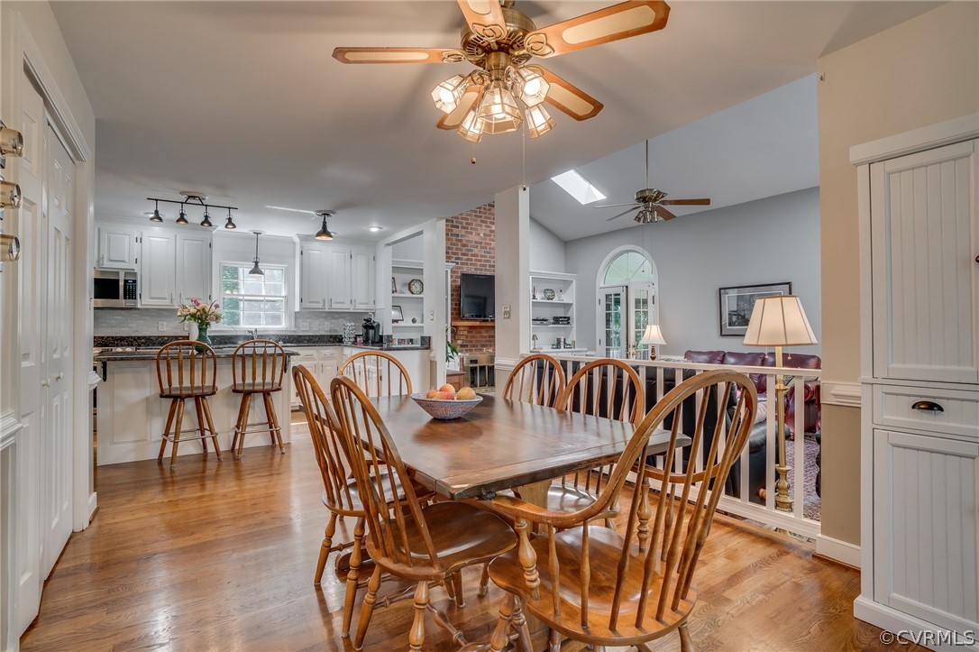 13131 Drakewood Road Midlothian, VA 23113 - Photo 8 of 29 a view of a dining room with furniture and a livingroom