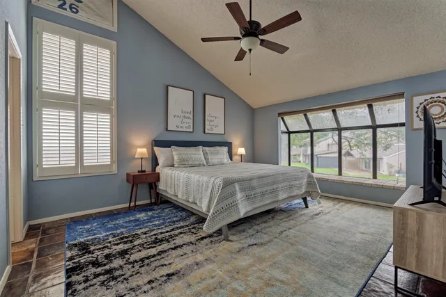 a patio with table and chairs