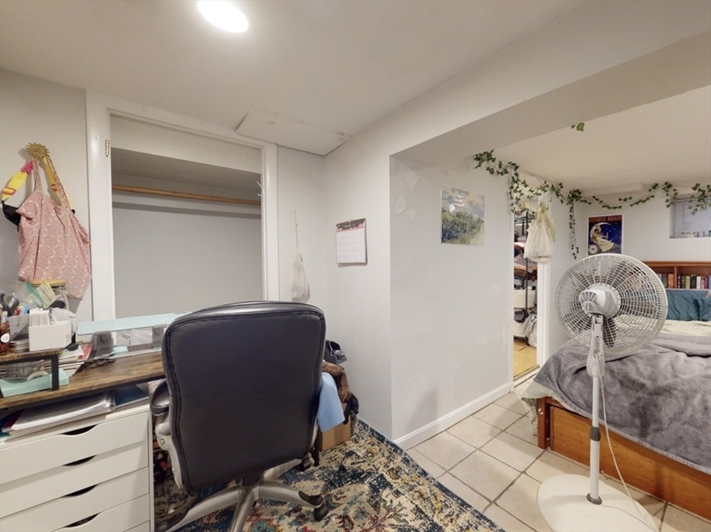 32 South Huntington Avenue, Unit 1 Boston, MA 02130 - Photo 12 of 17 a living room with furniture and wooden floor