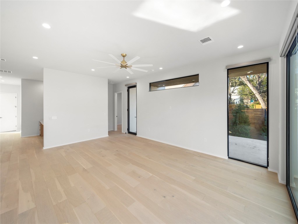 2107 Brackenridge Street, Unit B Austin, TX 78704 - Photo 16 of 36 a view of an empty room with glass door