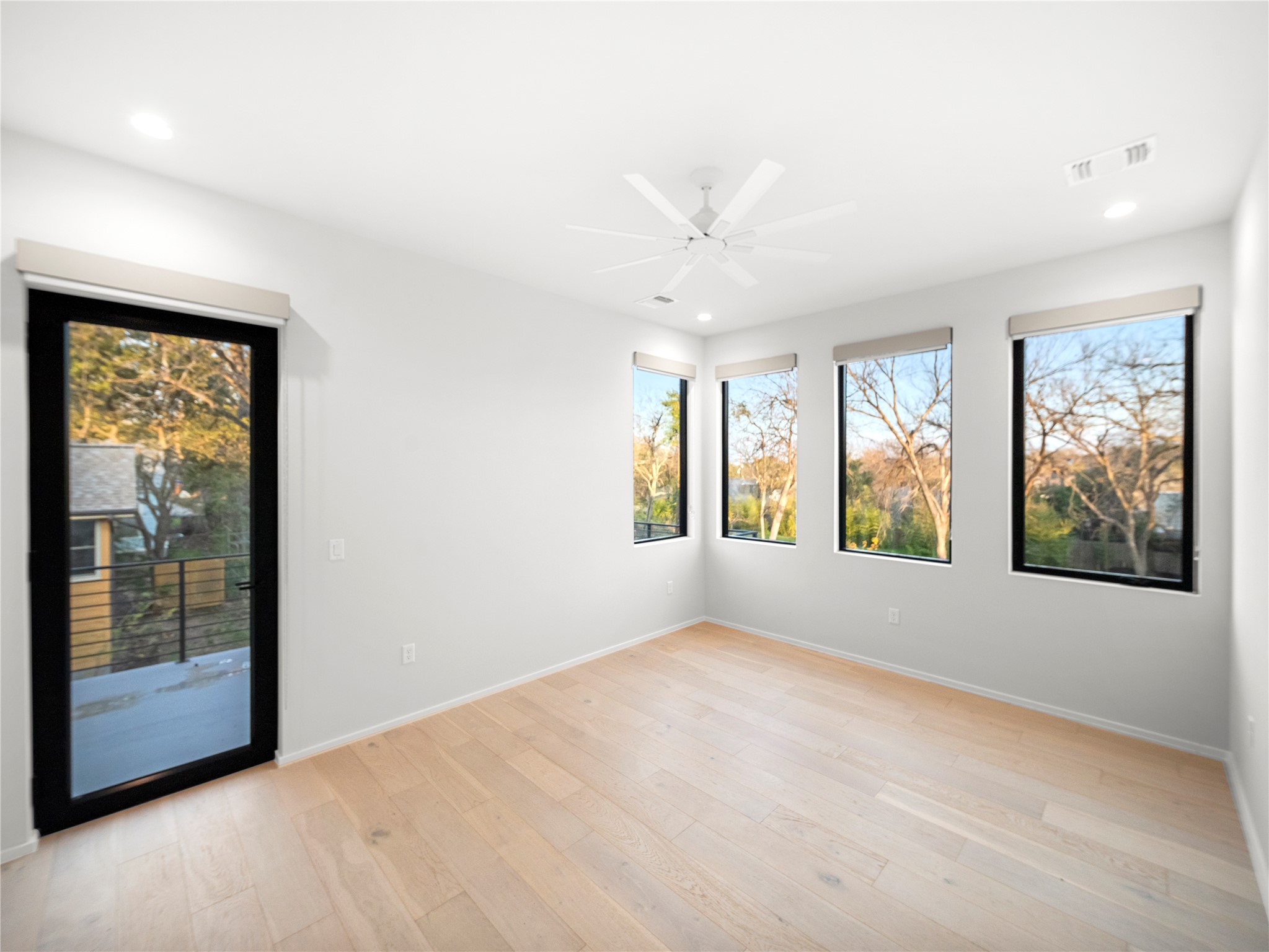 2107 Brackenridge Street, Unit B Austin, TX 78704 - Photo 18 of 36 a view of an empty room with windows