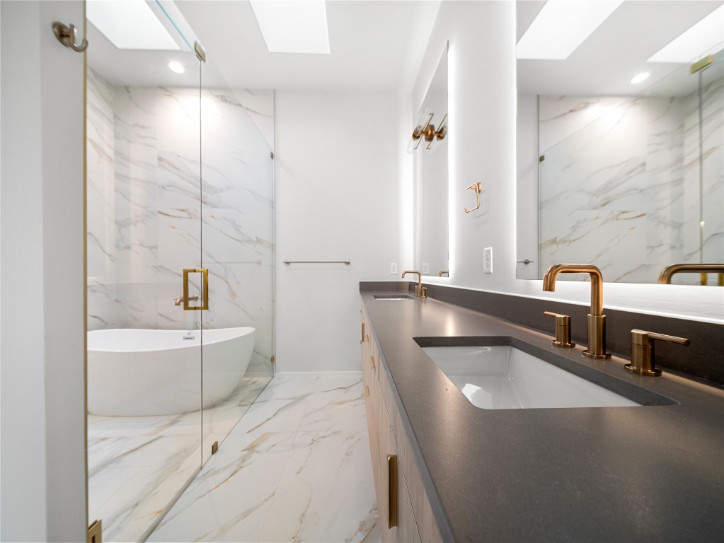 2107 Brackenridge Street, Unit B Austin, TX 78704 - Photo 19 of 36 a bathroom with a bathtub and a sink