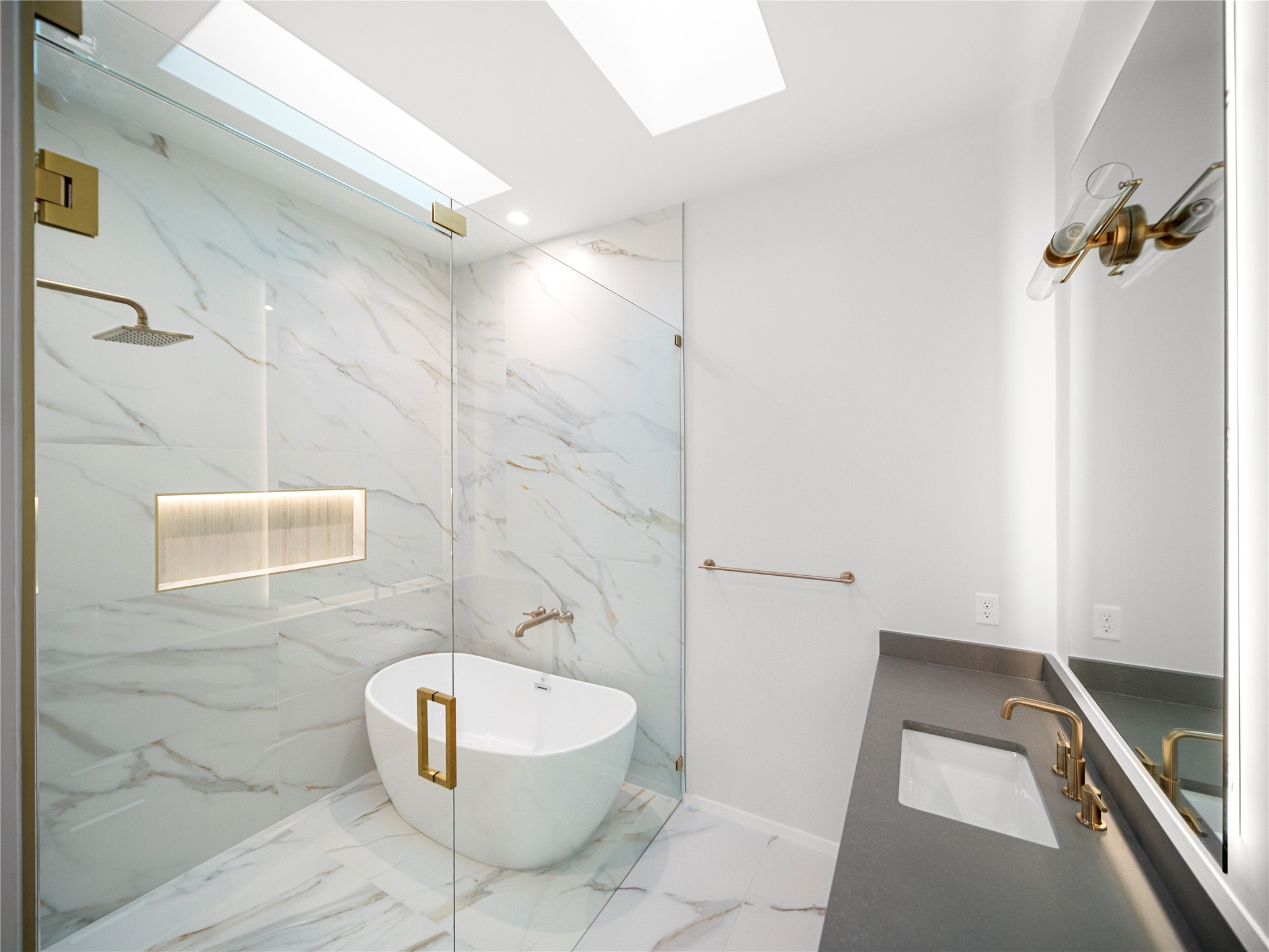 2107 Brackenridge Street, Unit B Austin, TX 78704 - Photo 21 of 36 a bathroom with a sink and a mirror