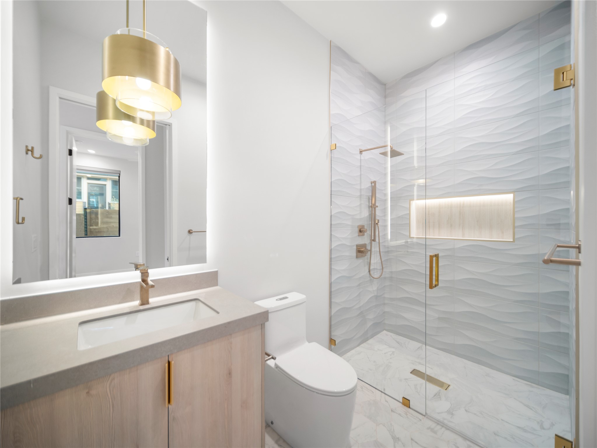 2107 Brackenridge Street, Unit B Austin, TX 78704 - Photo 27 of 36 a bathroom with a sink toilet and shower