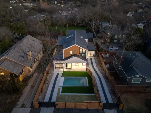 a view of swimming pool with a yard