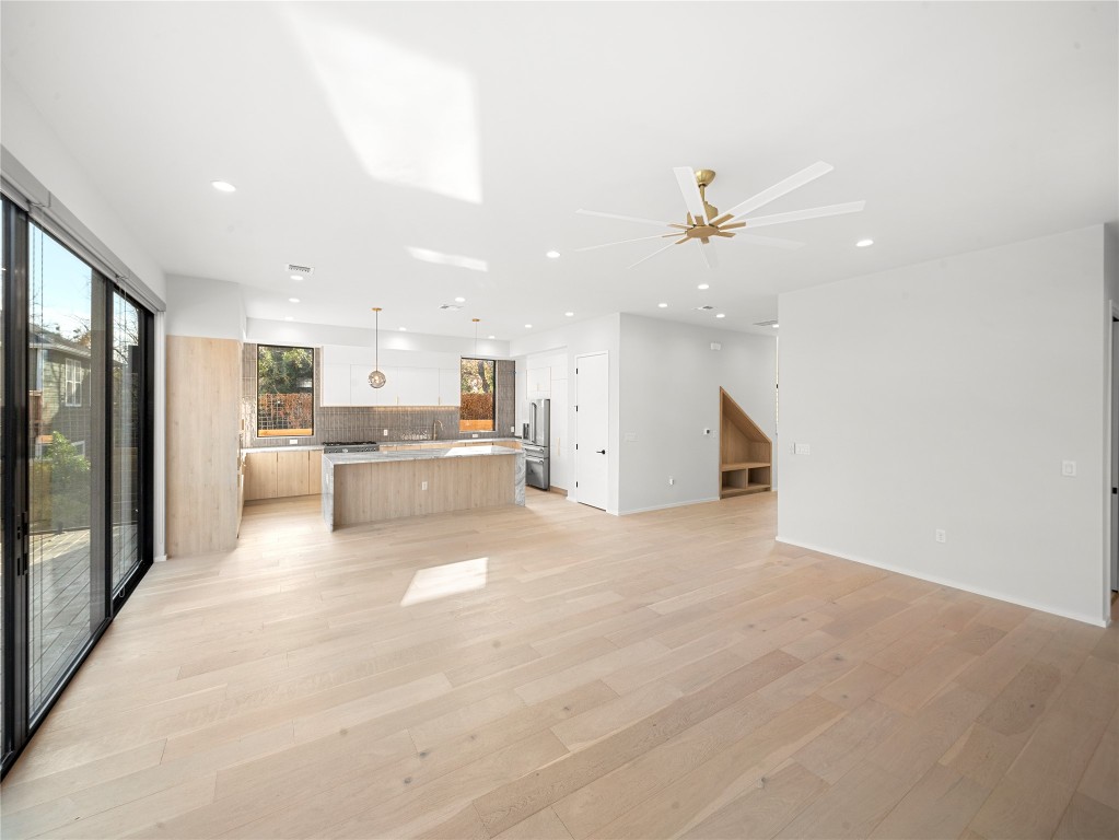 2107 Brackenridge Street, Unit B Austin, TX 78704 - Photo 8 of 36 a view of a kitchen with a sink and a large window