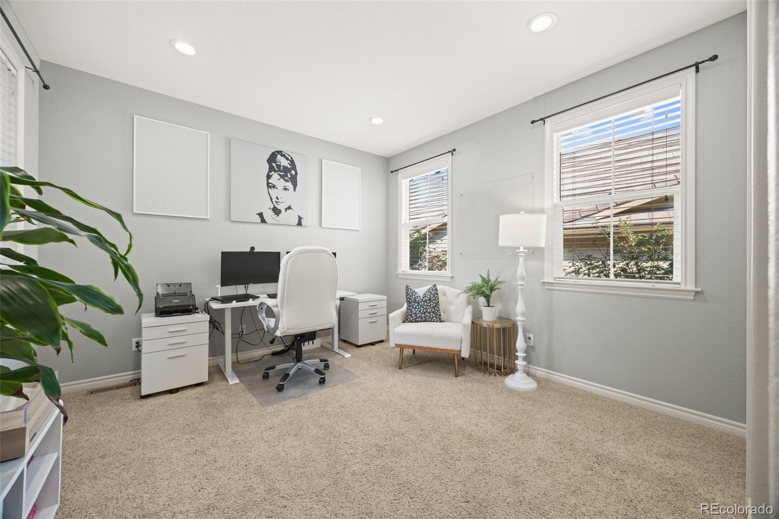 10466 Marigold Court Highlands Ranch, CO 80126 - Photo 14 of 50 a view of a livingroom with workspace and a window