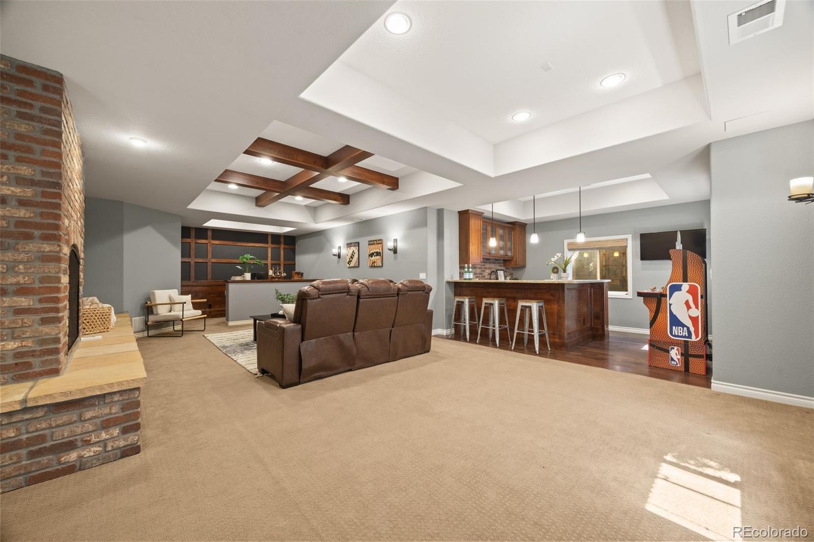 10466 Marigold Court Highlands Ranch, CO 80126 - Photo 30 of 50 a bed room with furniture and kitchen view