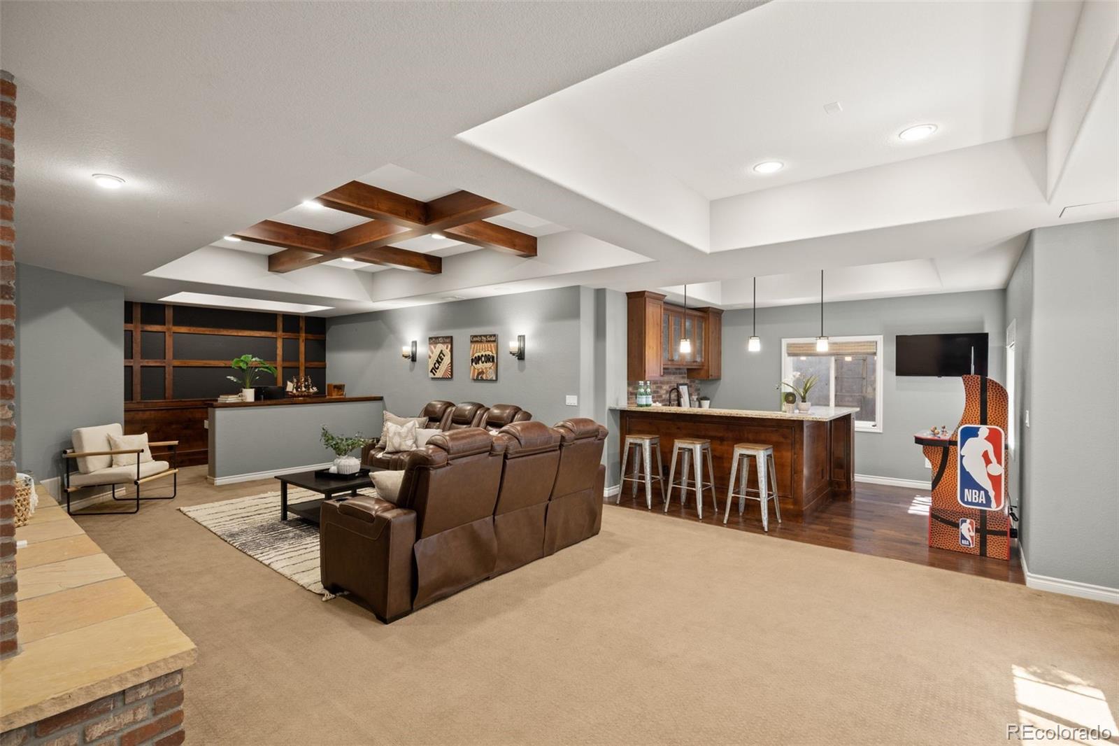 10466 Marigold Court Highlands Ranch, CO 80126 - Photo 34 of 50 a living room with furniture and kitchen view