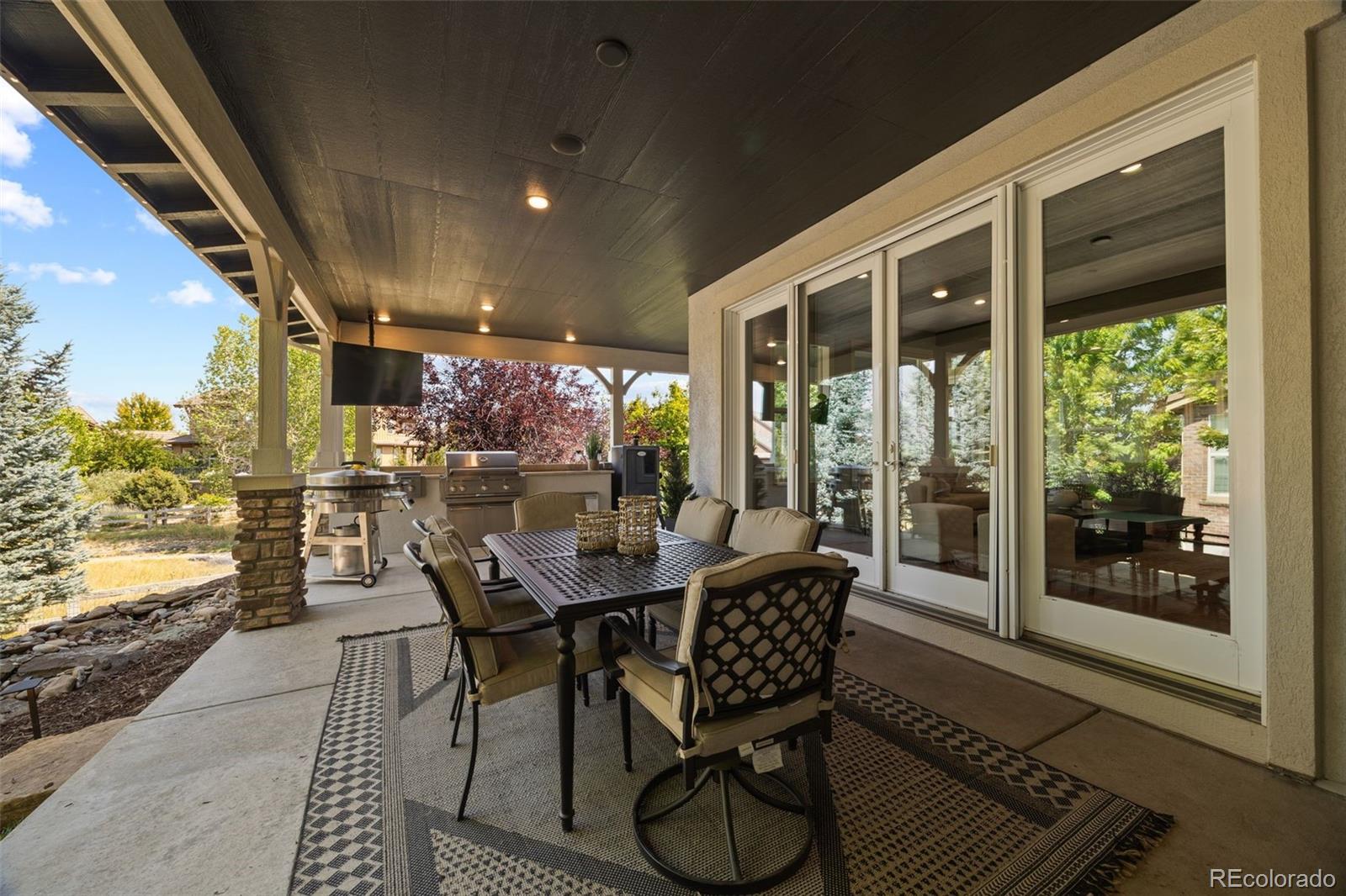 10466 Marigold Court Highlands Ranch, CO 80126 - Photo 40 of 50 a view of an outdoor dining space with furniture