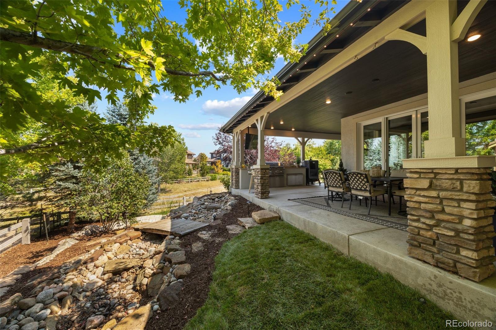 10466 Marigold Court Highlands Ranch, CO 80126 - Photo 44 of 50 a view of yard with patio