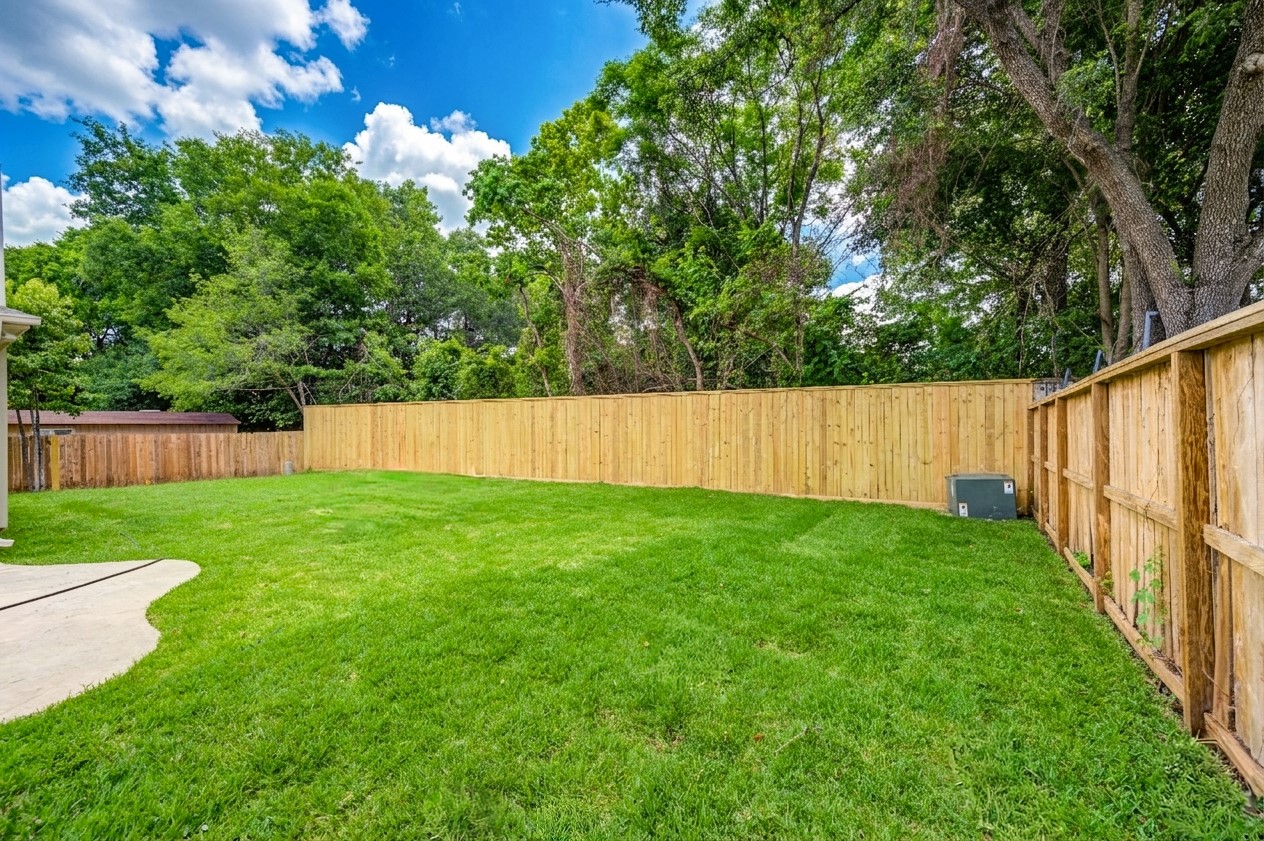 17318 Bonnard Circle Spring, TX 77379 - Photo 44 of 45 The new 8' fence across the back yard offers complete privacy with no neighbors behind!
