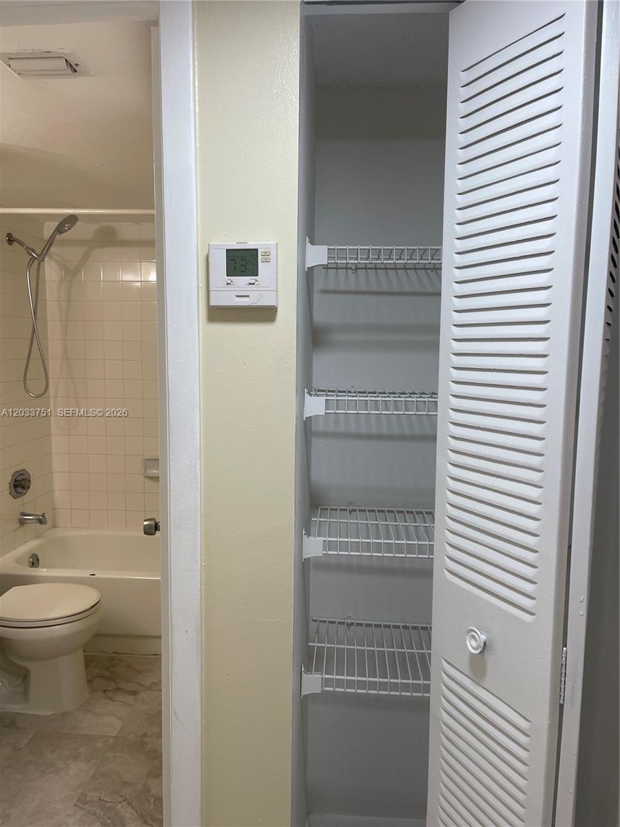 3252 Foxcroft Road, Unit 307 Miramar, FL 33025 - Photo 31 of 41 2nd and linen closet