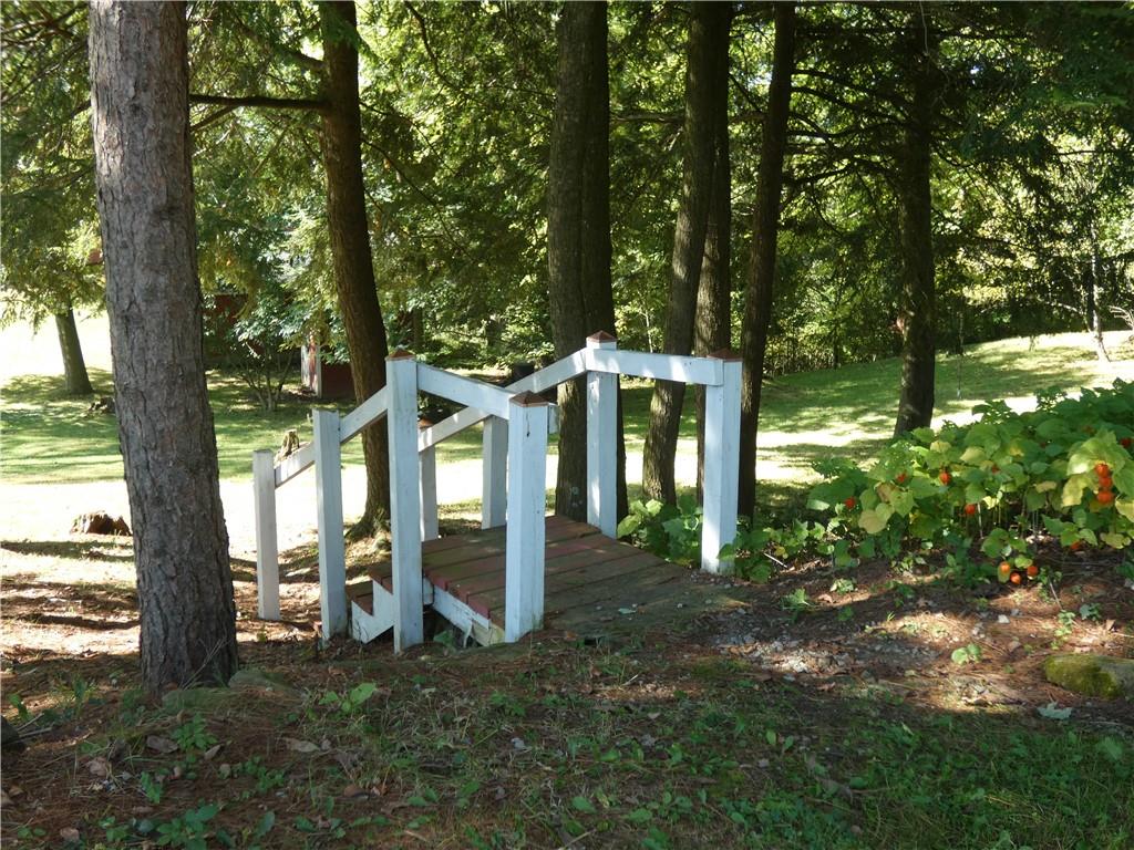 2223 Sandy Lake-Grove City Road Jackson Center, PA 16133 - Photo 20 of 30 a view of a house with backyard and sitting area