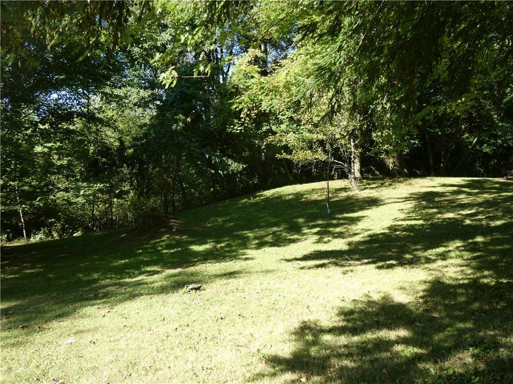 2223 Sandy Lake-Grove City Road Jackson Center, PA 16133 - Photo 21 of 30 a view of a backyard of the house