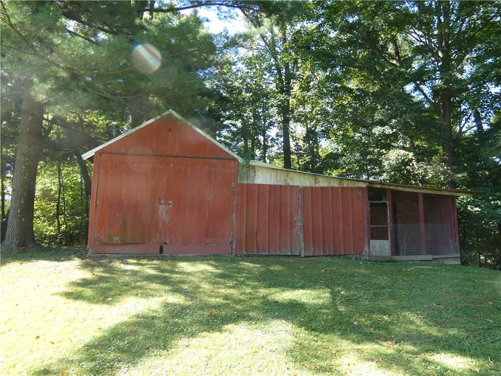 2223 Sandy Lake-Grove City Road Jackson Center, PA 16133 - Photo 25 of 30 a backyard of a house with lots of green space