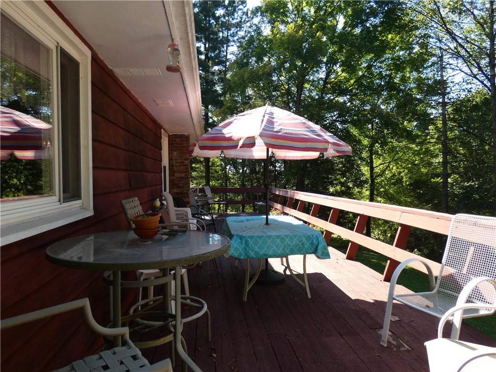 2223 Sandy Lake-Grove City Road Jackson Center, PA 16133 - Photo 5 of 30 a view of backyard with seating space and deck