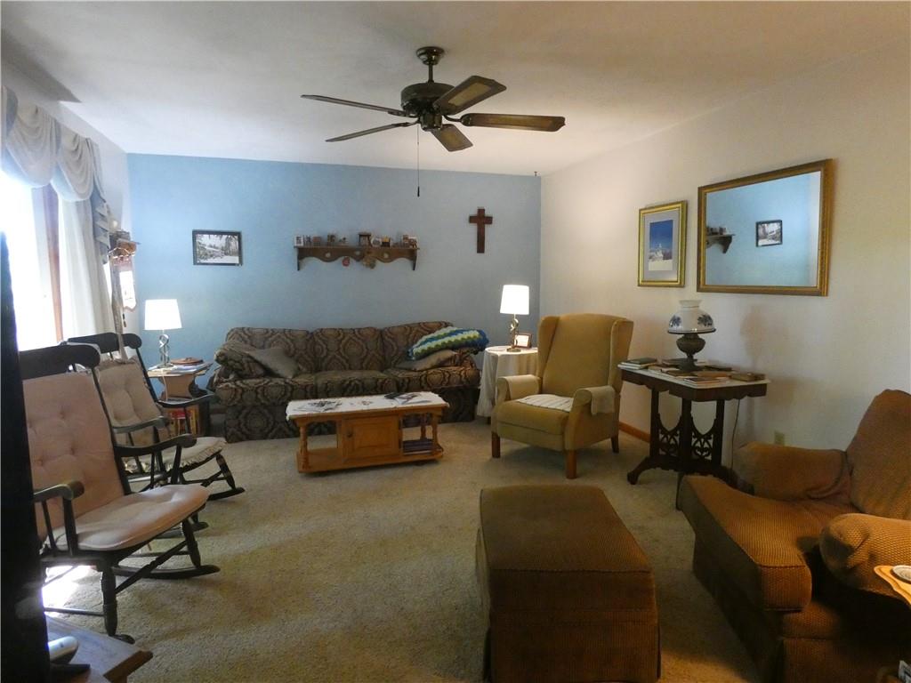 2223 Sandy Lake-Grove City Road Jackson Center, PA 16133 - Photo 10 of 30 a living room with furniture